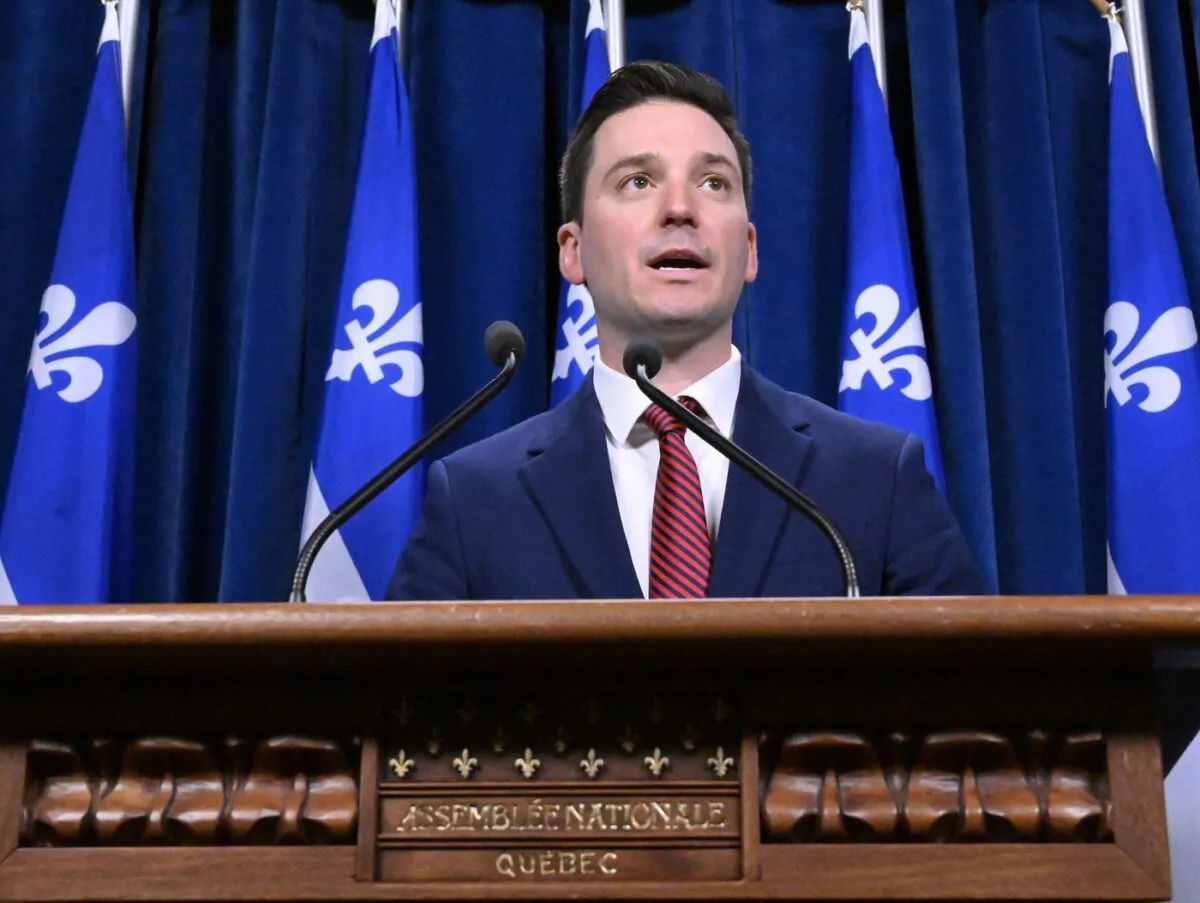 Quebec Justice Minister Simon Jolin-Barrette is facing an ethics investigation after appointing his friend as a provincial court judge. Jolin-Barrette responds to reporters questions in this May 11, 2023 file photo. (The Canadian Press/Jacques Boissinot)
