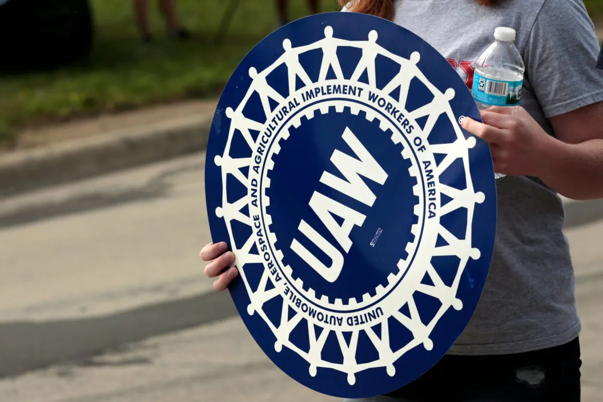 Members of the United Auto Workers (UAW) and supporters picket outside of General Motors Detroit-Hamtramck Assembly in Detroit as they strike on Sept. 22, 2019. (Jeff Kowalsky/AFP via Getty Images)
