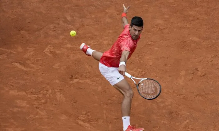 Novak Djokovic of Serbia returns the ball to Cameron Norrie of Britain at the Italian Open tennis tournament in Rome on May 16, 2023. (Andrew Medichini/AP Photo)