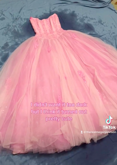 The prom dress after it was dyed into pink color. 