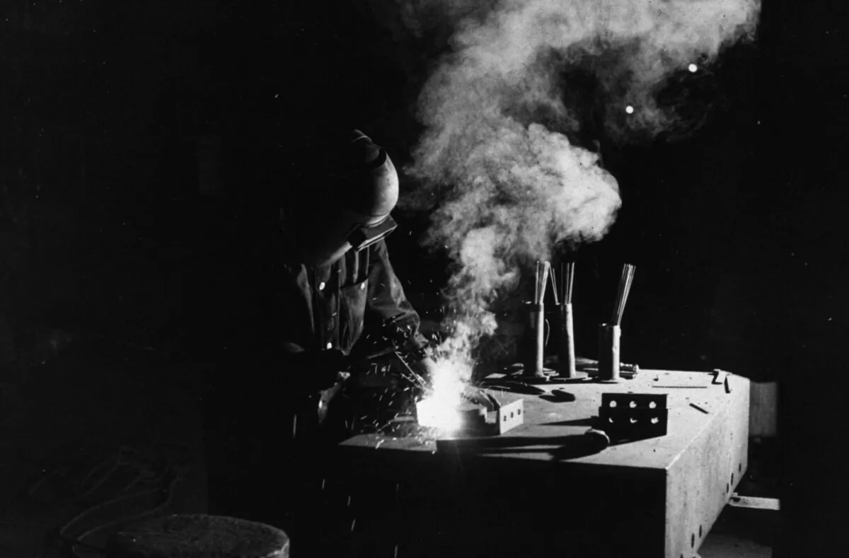 A welder at work in a structual shop of the Keystone Drilling Company in Beaver Falls, Pa., in January 1941. (John Vachon/Library Of Congress/Getty Images)