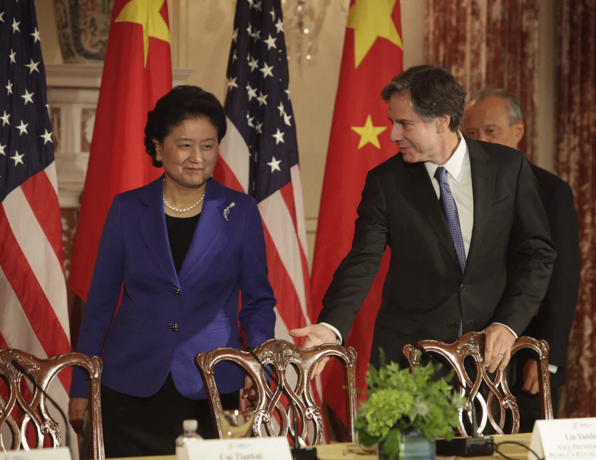Then-U.S. Deputy Secretary of State Blinken (right) meets with Liu Yandong, then-Vice Premier of China, in Washington on June 24, 2015. (Chris Kleponis/AFP via Getty Images)