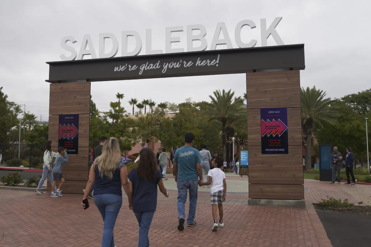 Congregants arrive at Saddleback Church in Lake Forest, Calif., on, Oct. 16, 2022. (AP Photo/Allison Dinner)