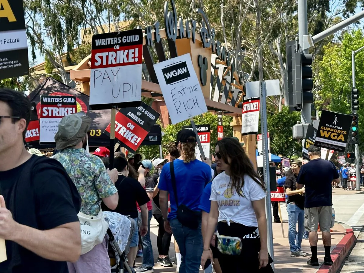 Members of the Screen Actors Guild - American Federation of Television and Radio Artists join the writers' strike launched by the Writers Guild of America in front of the Walt Disney Co.'s corporate headquarters in Burbank, Calif., on May 17, 2023. (Jill McLaughlin/The Epoch Times)