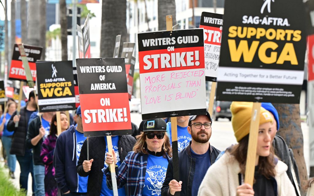 NextImg:Hollywood Writers Strike Wrapping up 4th Week; Union Rally Held Downtown LA