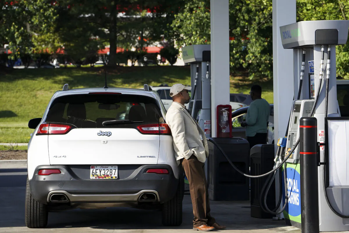 People use the gas station in Columbia, Md., on May 17, 2023. (Madalina Vasiliu/The Epoch Times)