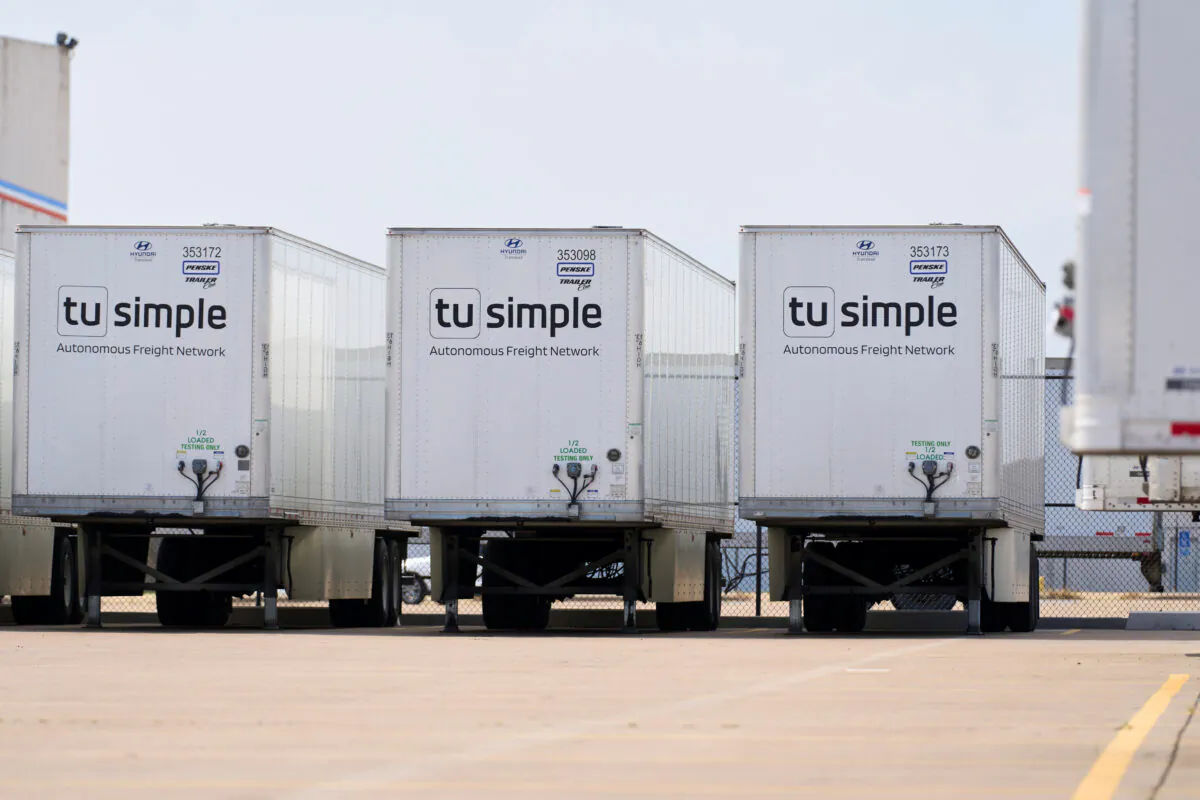 TuSimple truck-trailers are parked at their facility at AllianceTexas, a 27,000 acre business complex boasting some of the country’s largest freight operations, in Fort Worth, Texas, on May 18, 2022. (Cooper Neill/Reuters)