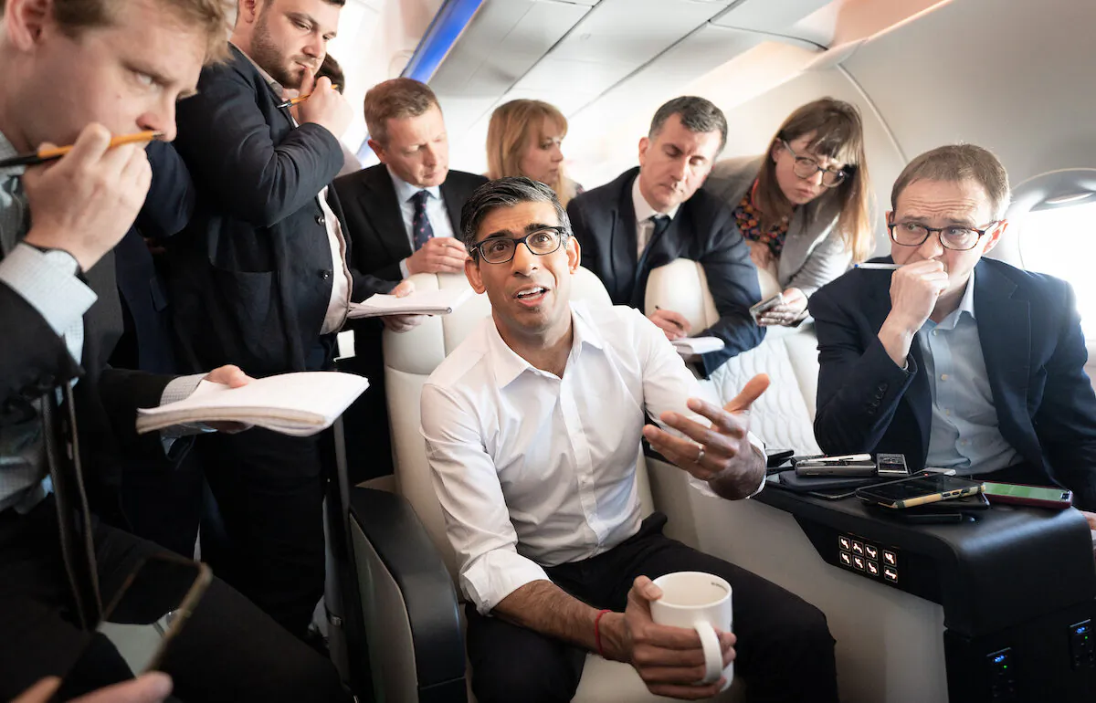 Prime Minister Rishi Sunak with political journalists on board a government plane as he heads to Japan to attend the G7 summit in Hiroshima on May 17, 2023. (PA Media)