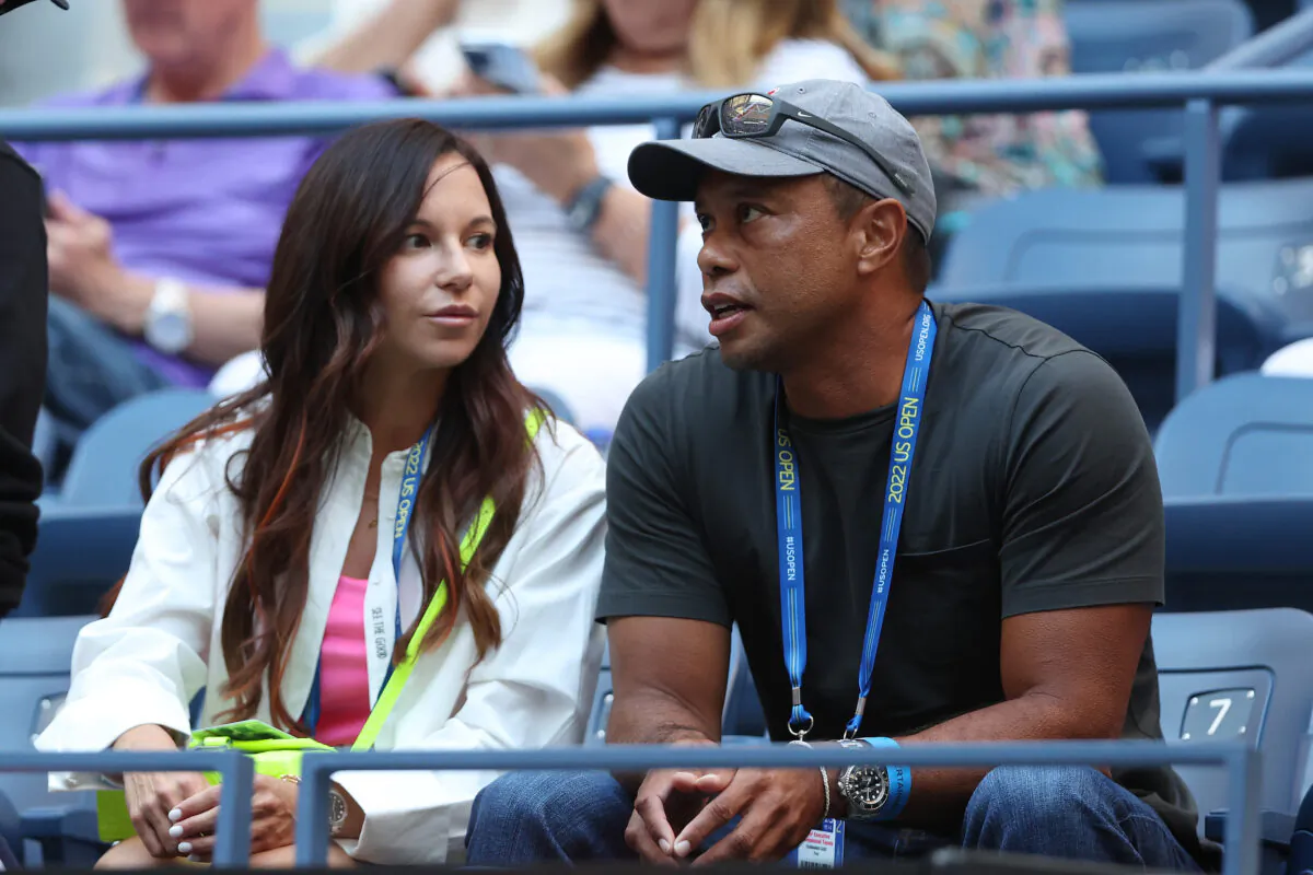 Erica Herman (L) and Tiger Woods look on prior to the Women's Singles Second Round match between Anett Kontaveit of Estonia and Serena Williams of the United States at the 2022 US Open at USTA Billie Jean King National Tennis Center in the Flushing neighborhood of the Queens borough of New York City on Aug. 31, 2022. (Matthew Stockman/Getty Images)