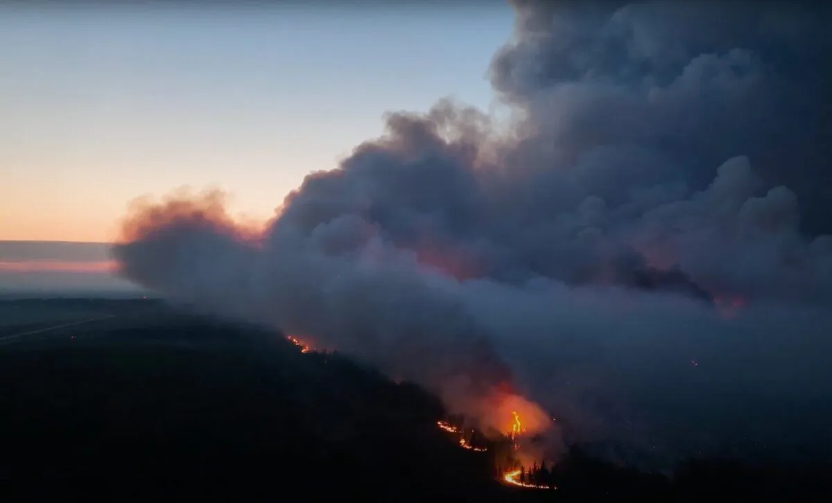 Smoke is shown as the Stoddart Creek wildfire burns in British Columbia in this May 14, 2023 handout image taken from video. (The Canadian Press/HO-BC Wildfire Service)