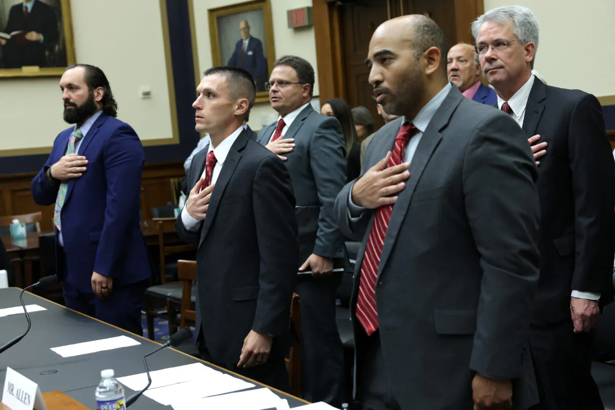 From left to right: Suspended FBI special agent Garret O’Boyle, former FBI agent Steve Friend, and suspended FBI agent Marcus Allen during a hearing in Washington on May 18, 2023. (Alex Wong/Getty Images)