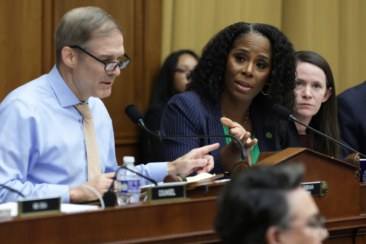 Ranking member Del. Stacey Plaskett (D-V.I.) (R) debates with Chairman Rep. Jim Jordan (R-Ohio) (L) during a hearing before the Select Subcommittee on the Weaponization of the Federal Government of the House Judiciary Committee at Rayburn House Office Building on Capitol Hill in Washington, on May 18, 2023. (Alex Wong/Getty Images)