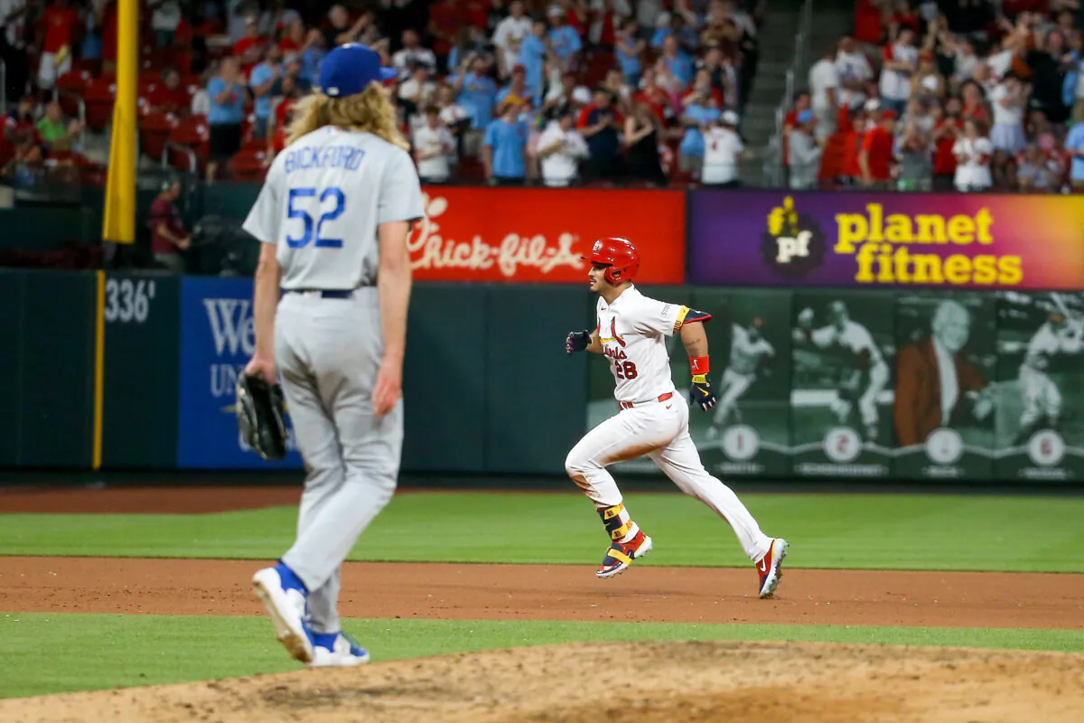 Nolan Arenado (28) of the St. Louis Cardinals runs the bases after hitting a solo home run off Phil Bickford (52) of the Los Angeles Dodgers during the fourth inning at Busch Stadium in St. Louis on May 18, 2023. (Scott Kane/Getty Images)