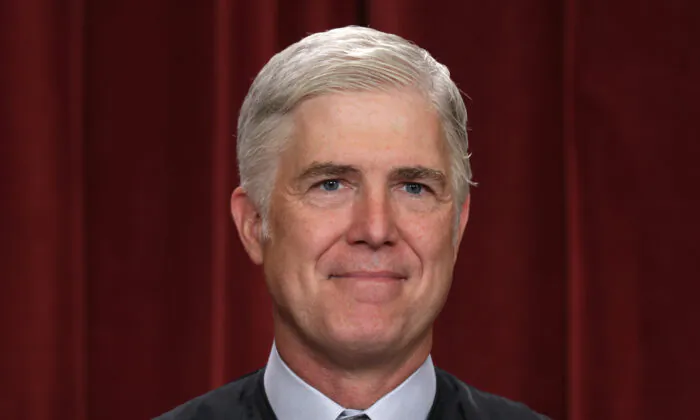 United States Supreme Court Associate Justice Neil Gorsuch poses for an official portrait at the East Conference Room of the Supreme Court building in Washington, on Oct. 7, 2022. (Alex Wong/Getty Images)