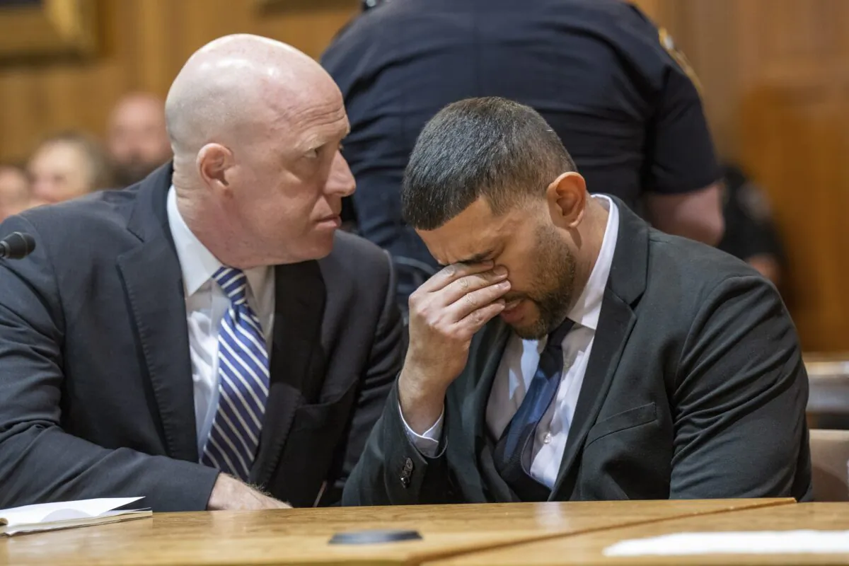 Nauman Hussain (R), sitting with his attorney Lee Kindlon, reacts as the verdict is read in his trial at Schoharie County Court in Schoharie, N.Y., on May 17, 2023.  (Jim Franco/The Albany Times Union via AP)