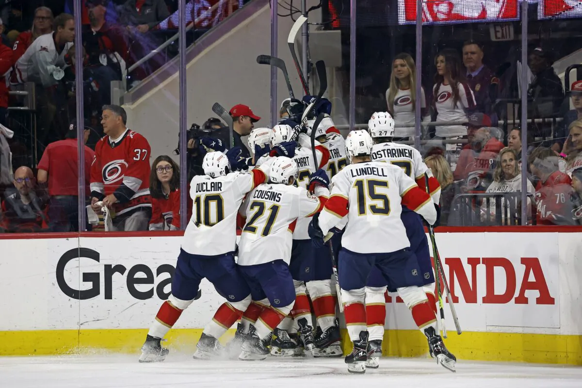 The Florida Panthers celebrate an apparent goal by Ryan Lomberg that was later disallowed, during the first overtime of Game 1 of the team's NHL hockey Stanley Cup Eastern Conference finals against the Carolina Hurricanes in Raleigh, N.C., on May 18, 2023. (Karl B DeBlaker/AP Photo)