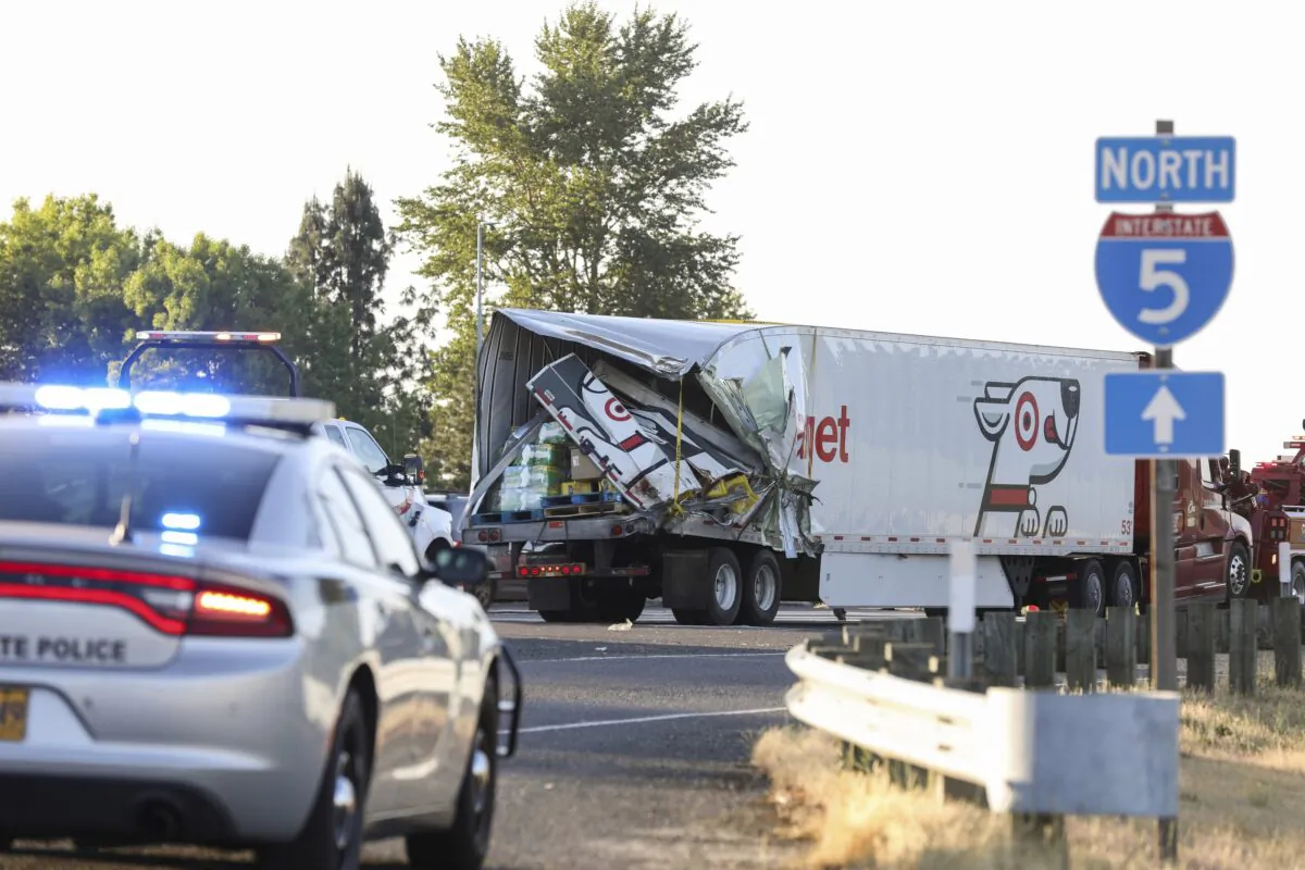 The back end of a semi-truck sits along Interstate 5 in Marion County, Ore., on May 18, 2023. (Abigail Dollins/Statesman Journal via AP)