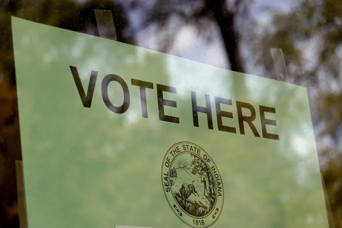 A sign hangs in the window of the Wicker Park Social Center polling place in Highland, Indiana, in a file photo. (Scott Olson/Getty Images)