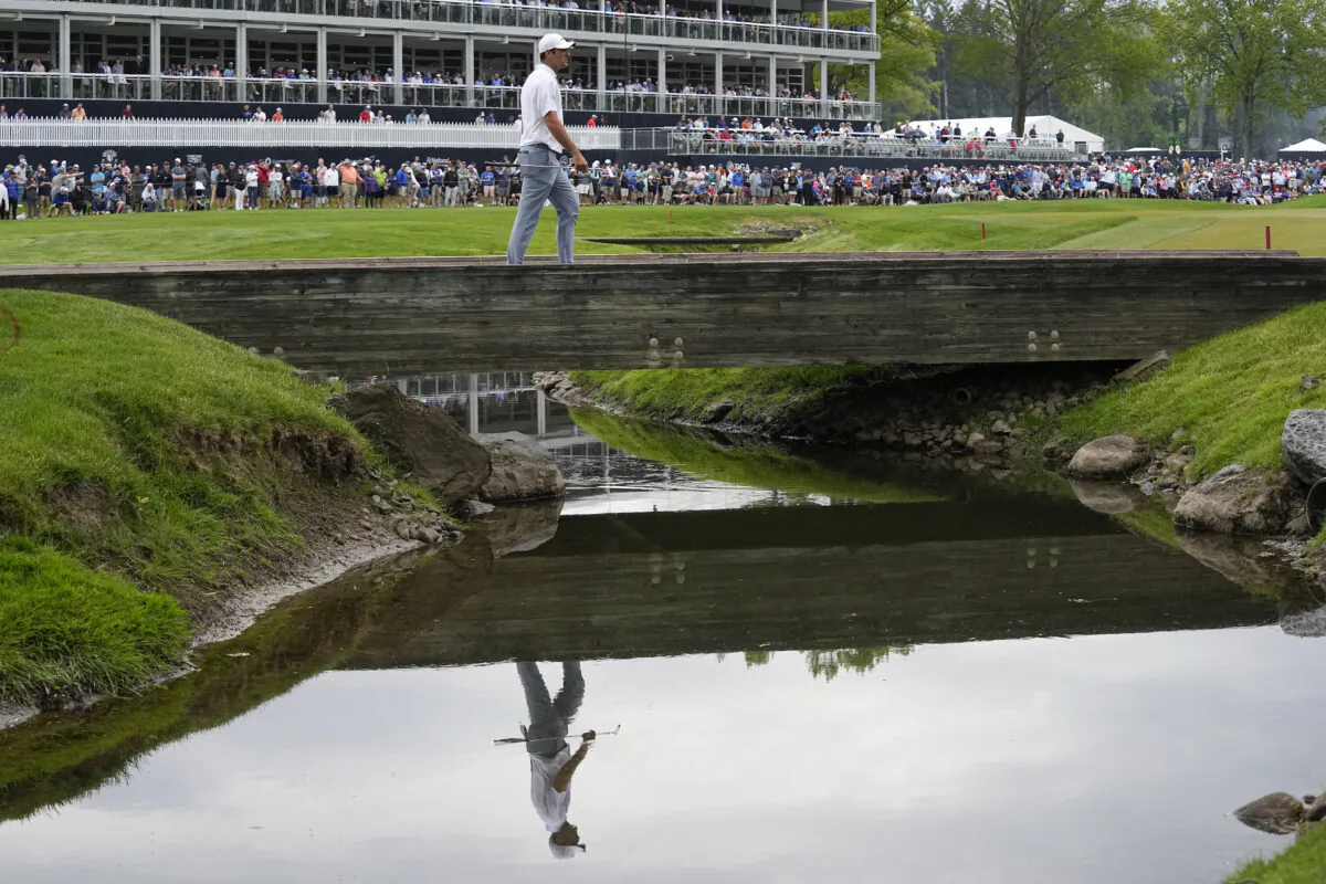 Scottie Scheffler walks on the sixth hole during the second round of the PGA Championship golf tournament at Oak Hill Country Club in Pittsford, N.Y.,  on May 19, 2023. (Abbie Parr/AP Photo)