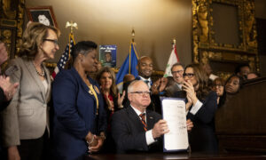 MN Governor Walz approves stricter gun control laws.