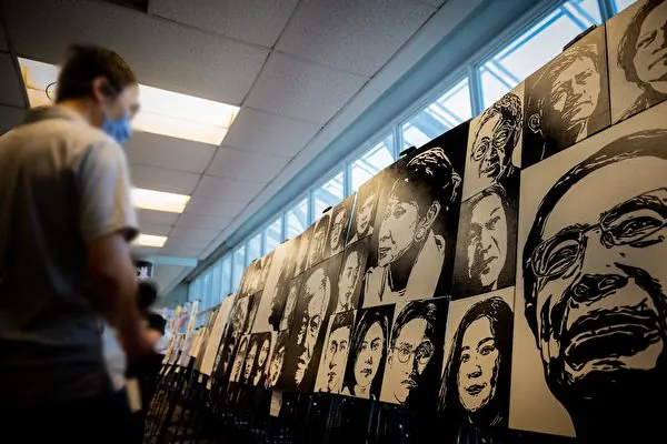 Artworks featuring Hong Kong political figures were on display in Toronto on May 13, 2023. (Courtesy of Leo Tran)