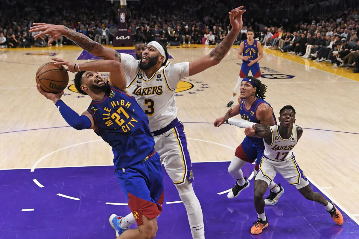 Jamal Murray (27) of the Denver Nuggets shoots the ball against Anthony Davis (3) of the Los Angeles Lakers  in game three of the Western Conference Finals in Los Angeles on May 20, 2023. (Kevork Djansezian/Getty Images)
