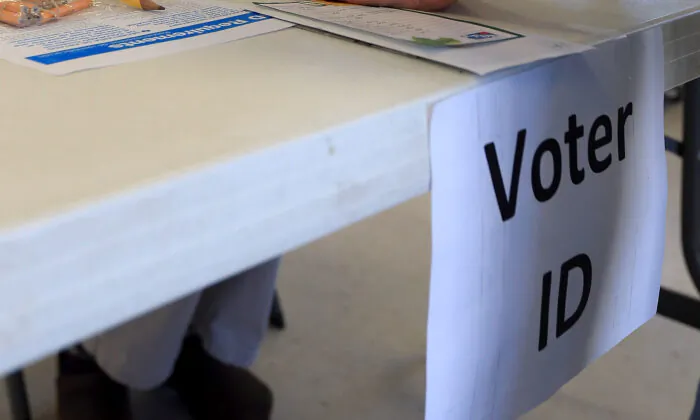 A "Voter ID" sign at a polling site in a file photo. (Jeff Swensen/Getty Images)
