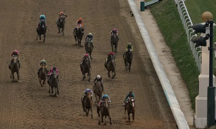Mage (8), with Javier Castellano aboard, wins the 149th running of the Kentucky Derby horse race at Churchill Downs in Louisville, Ky., on May 6, 2023. (Charlie Riedel/AP Photo)