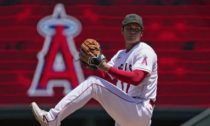 Los Angeles Angels starting pitcher Shohei Ohtani warms up prior to the second inning of a baseball game against the Minnesota Twins in Anaheim, Calif., on May 21, 2023. (Mark J. Terrill/AP Photo)