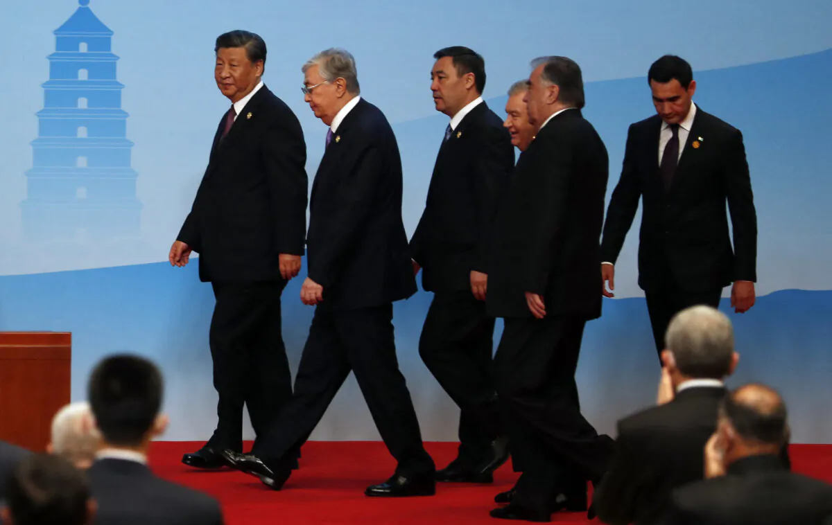 (L-R) Chinese leader Xi Jinping, Kazakhstan's President Kassym-Jomart Tokayev, Kyrgyzstan's President Sadyr Japarov, Uzbekistan's President Shavkat Mirziyoyev, Tajikistan's President Emomali Rahmon and Turkmenistan's President Serdar Berdymukhamedov arrive for the joint press conference of of the China-Central Asia Summit in Xian, in China's northern Shaanxi province on May 19, 2023. (FLORENCE LO/POOL/AFP via Getty Images)