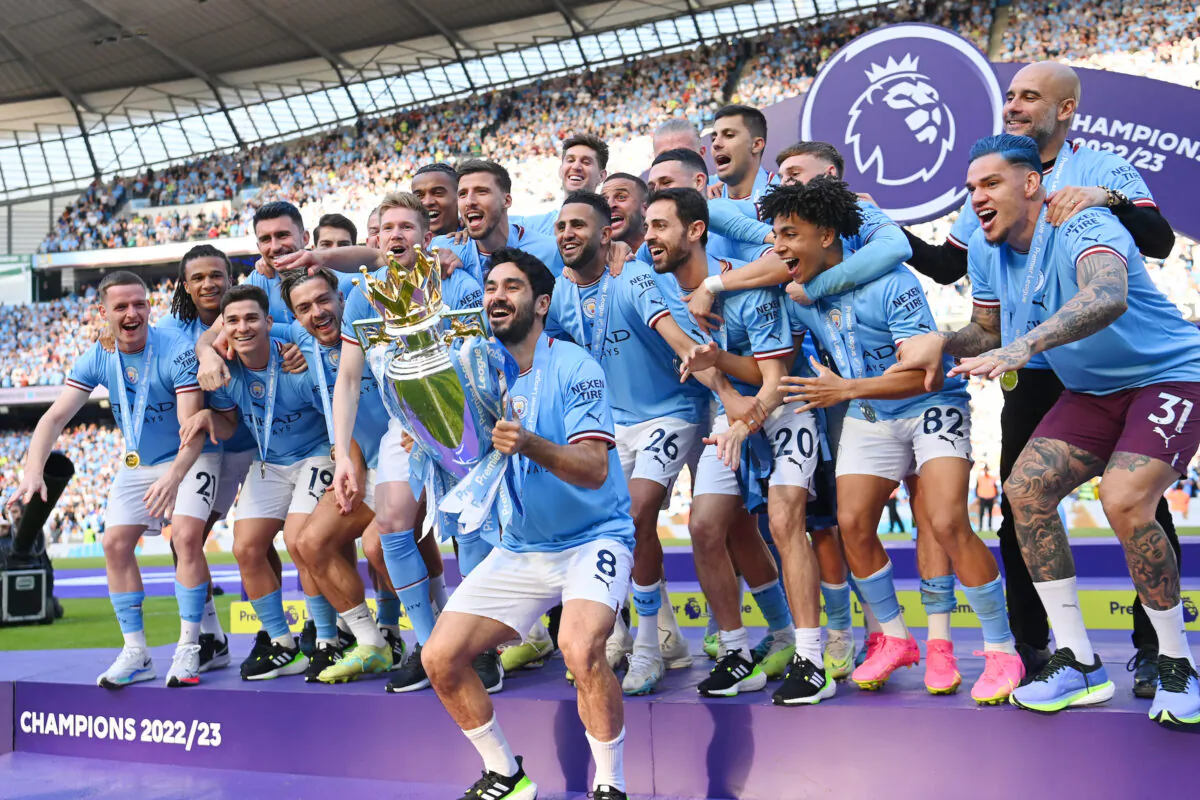 Manchester City captain Ilkay Gundogan lifts the Premier League trophy after the Premier League match between Manchester City and Chelsea FC at Etihad Stadium in Manchester, England, on May 21, 2023. (Michael Regan/Getty Images)