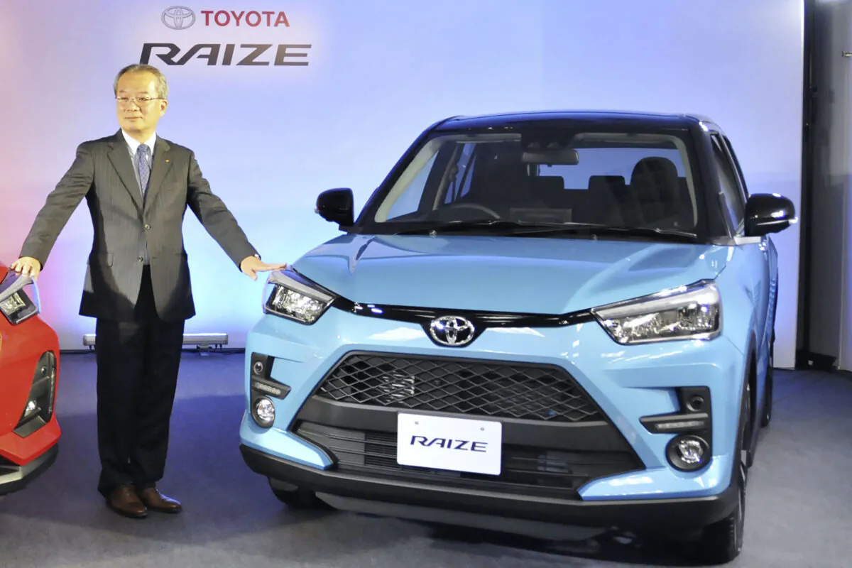 A Toyota Raize hybrid vehicle produced by Daihatsu Motor Co. is unveiled in Tokyo on Nov. 5, 2019. (Kyodo News via AP)