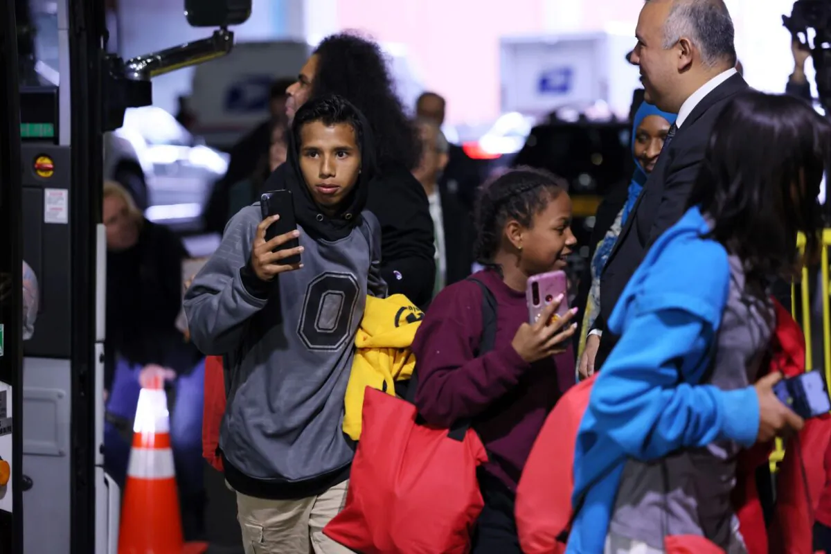 Illegal immigrants arrive at the Port Authority terminal in New York City on May 3, 2023. (Michael M. Santiago/Getty Images)