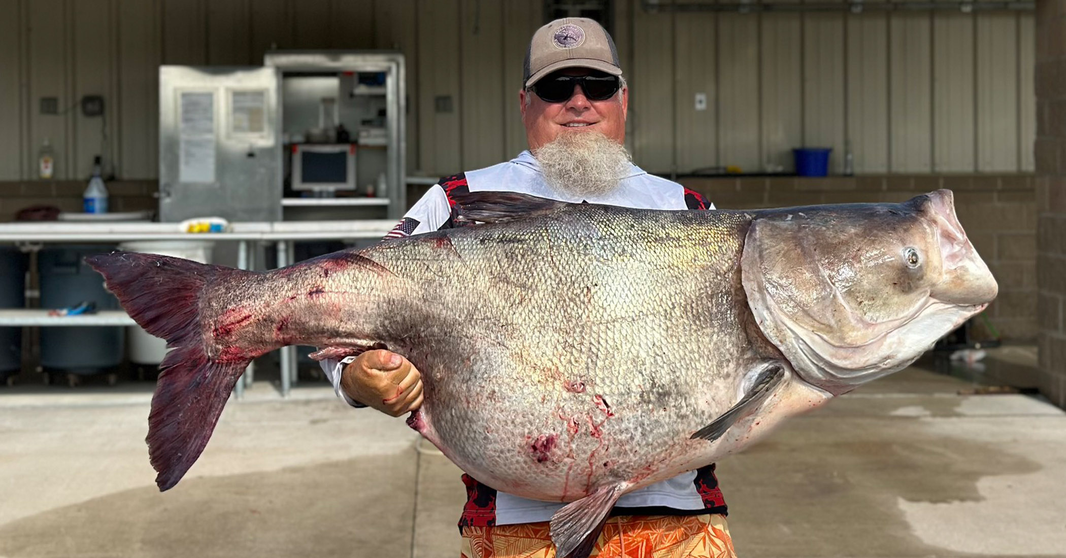 NextImg:Oklahoma angler reels in monstrous 'nuisance' bighead carp weighing 118 pounds for state record