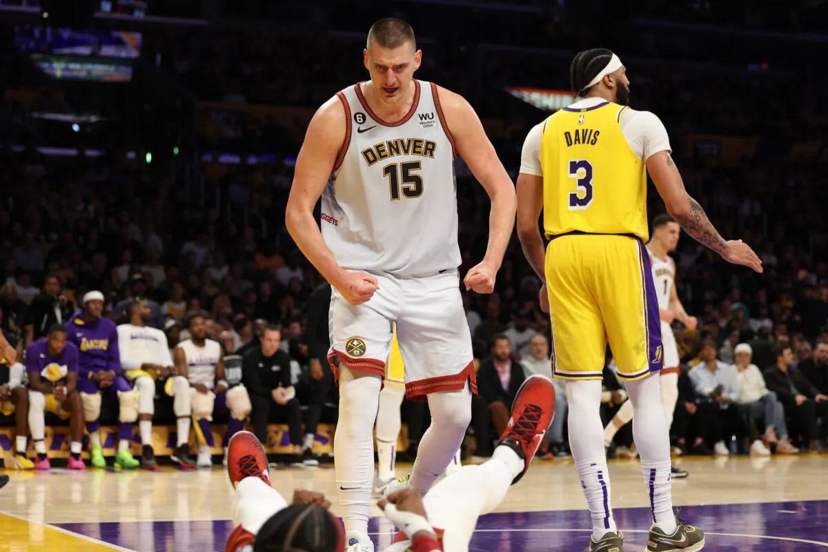 Nikola Jokic (15) of the Denver Nuggets reacts to a foul during the third quarter against the Los Angeles Lakers in game four of the Western Conference Finals at Crypto.com Arena in Los Angeles on May 22, 2023. (Harry How/Getty Images)