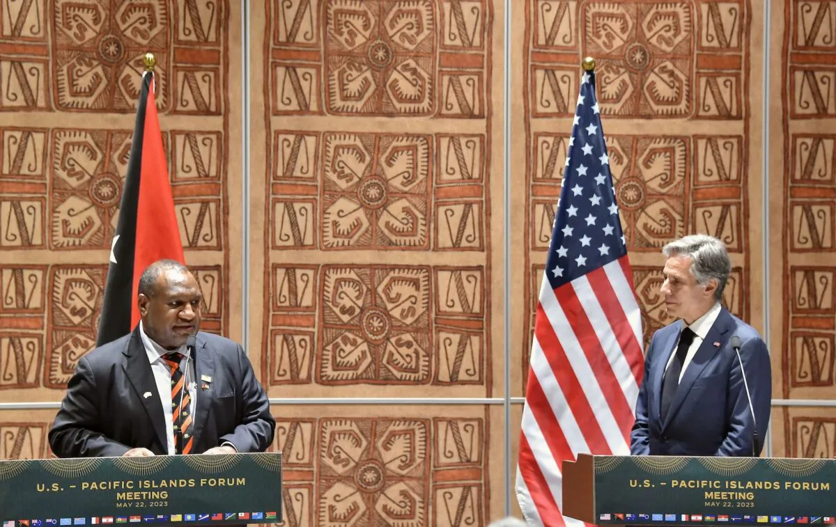 Papua New Guinea's Prime Minister James Marape speaks as U.S. Secretary of State Antony Blinken looks on during a joint press conference following the U.S.-Pacific Islands Forum at the APEC Haus in Port Moresby on May 22, 2023. (Andrew Kutan/AFP via Getty Images)