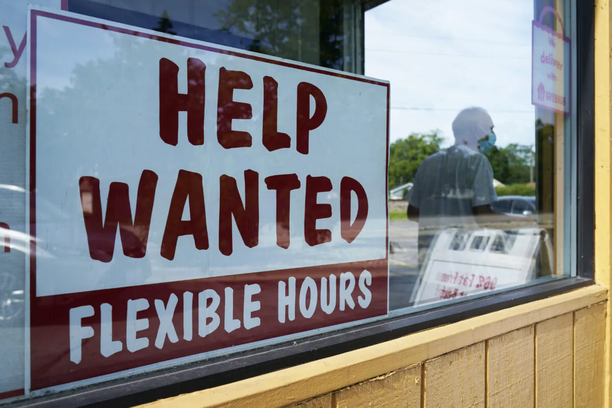 A help wanted sign is displayed in Deerfield, Ill., on Sept. 21, 2022. (Nam Y. Huh/AP Photo/ File)