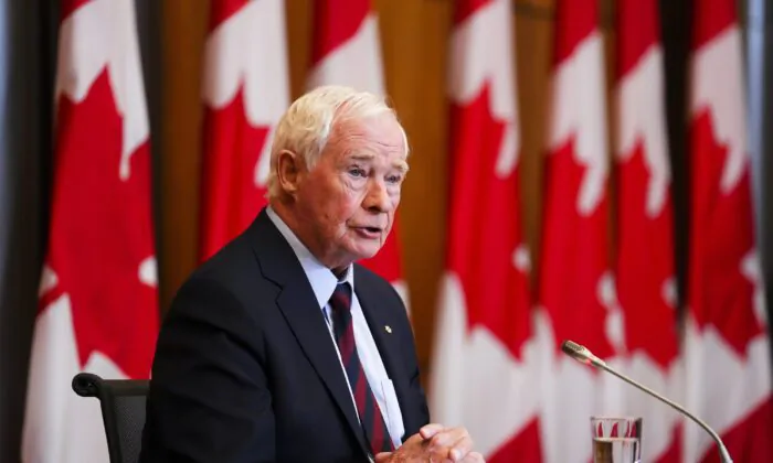 David Johnston, Independent Special Rapporteur on Foreign Interference, presents his first report in Ottawa on May 23, 2023. (Sean Kilpatrick/The Canadian Press)