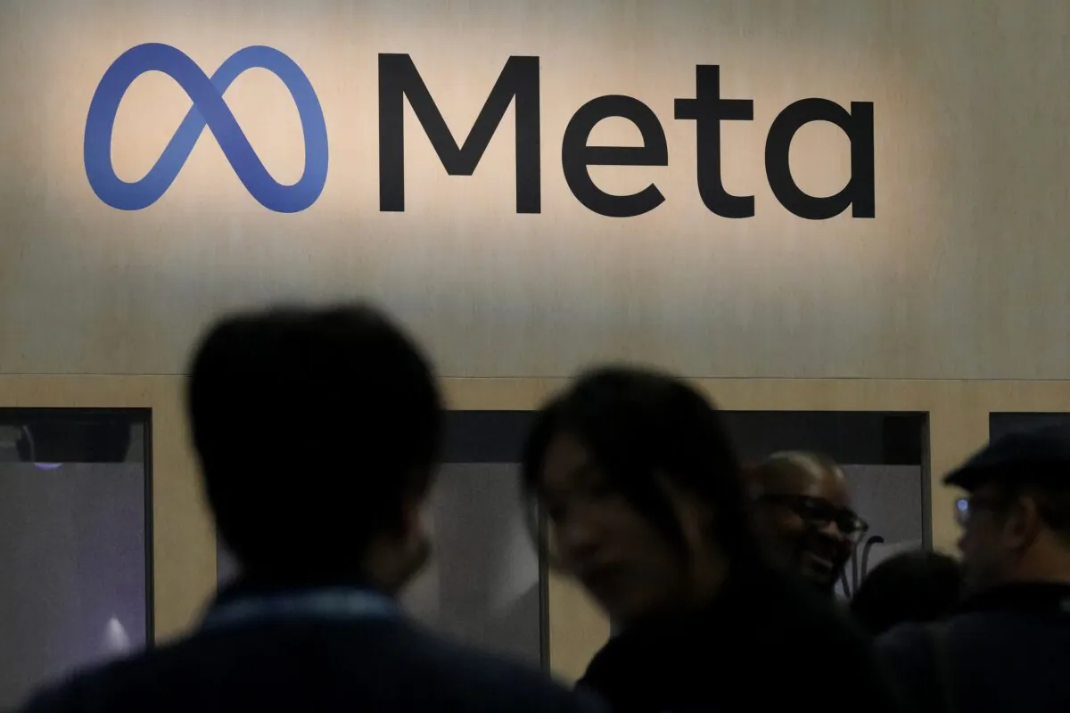 Attendees visit the Meta booth at the Game Developers Conference 2023 in San Francisco on March 22, 2023. (Jeff Chiu/AP Photo)
