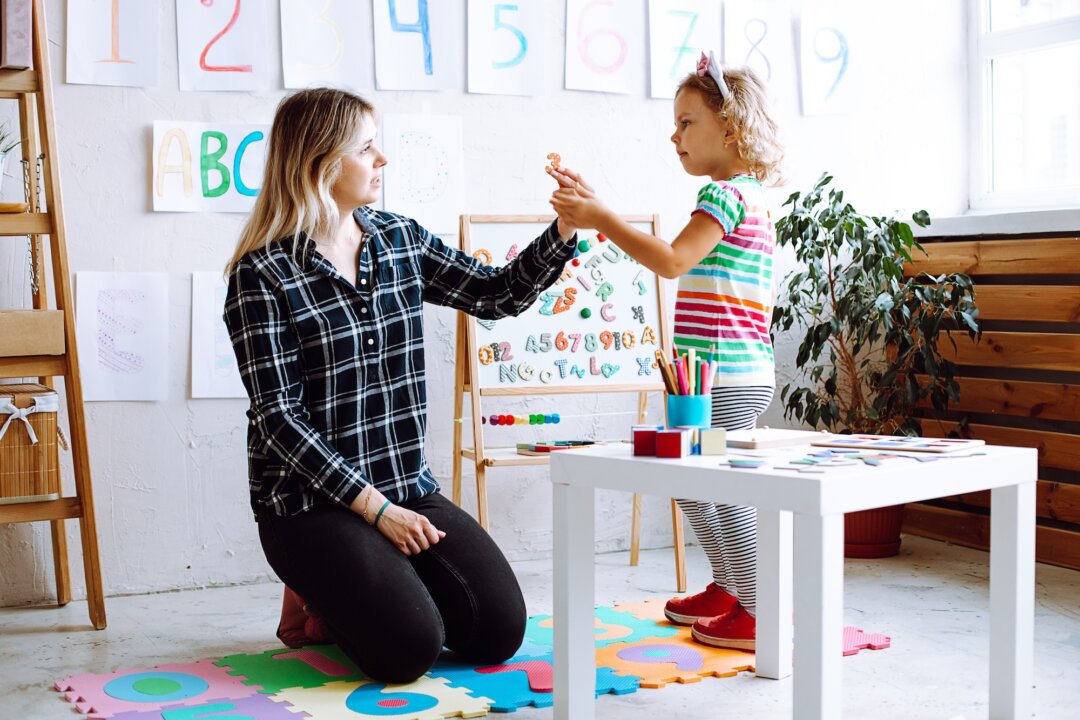 Preschoolers are encouraged to compete with their peers for toys, space, and attention. (tativophotos/Shutterstock)