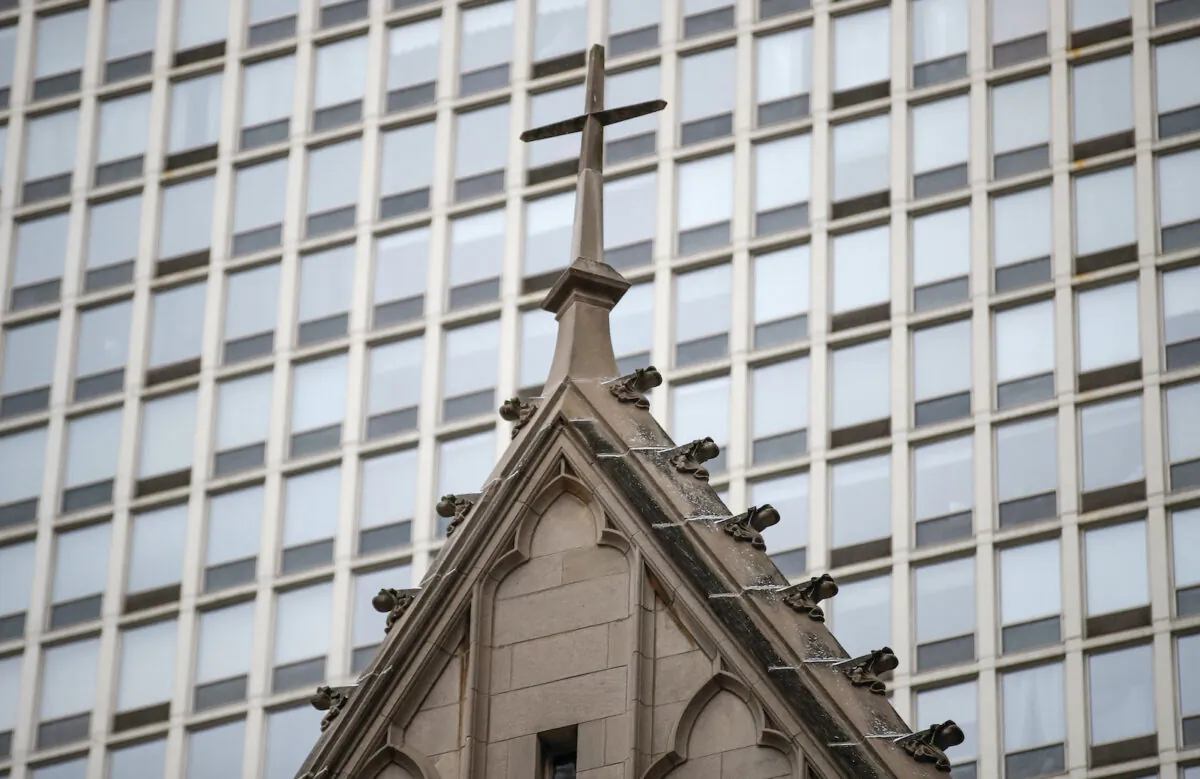 The cross atop of the Archdiocese of Chicago is seen on Jan. 2, 2019, in Chicago, Ill., following a press conference by advocates for clergy abuse victims. (Kamil Krzaczynski/AFP via Getty Images)
