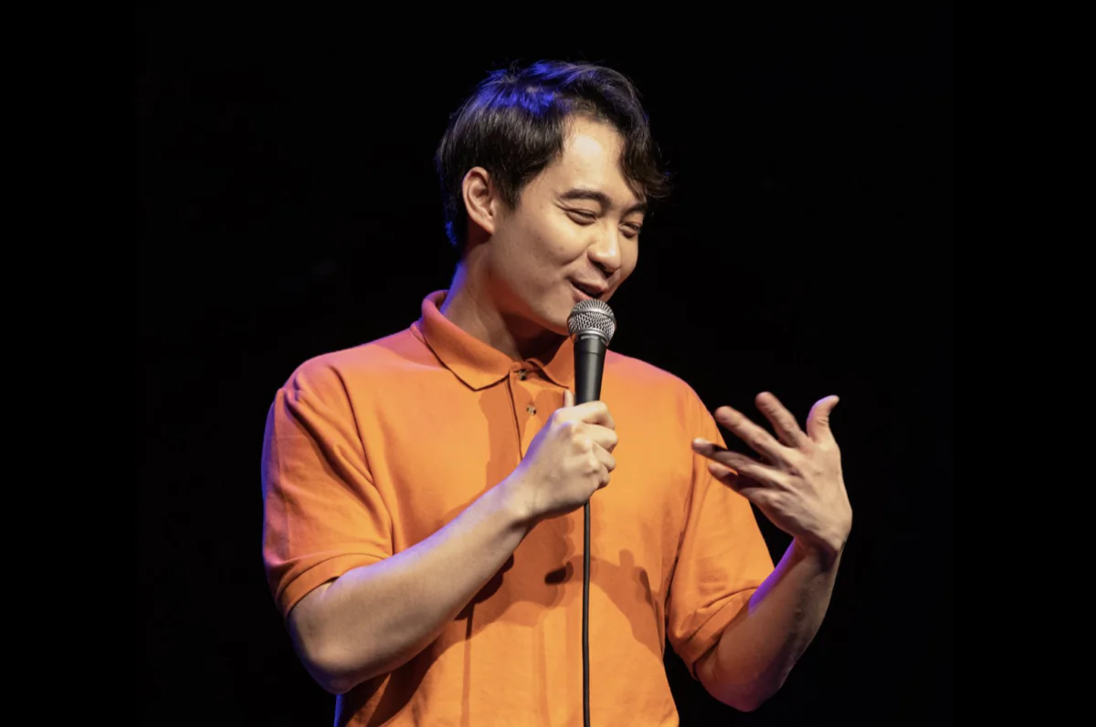 Nigel Ng in a comedy show in New York, U.S, on April 19, 2022. (Screenshot/ Facebook of Nigel Ng) 