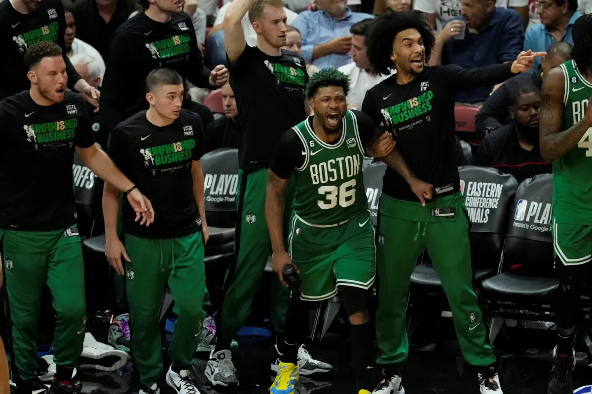 Boston Celtics players cheer during the second half of Game 4 during the NBA basketball playoffs Eastern Conference finals against the Miami Heat in Miami on May 23, 2023. (Rebecca Blackwell/AP Photo)
