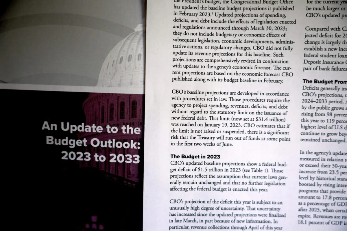 Detail images from the Congressional Budget Office's report, “An Update to the Budget Outlook: 2023 to 2033,” in Washington, D.C., on May 12, 2023. (Chip Somodevilla/Getty Images)