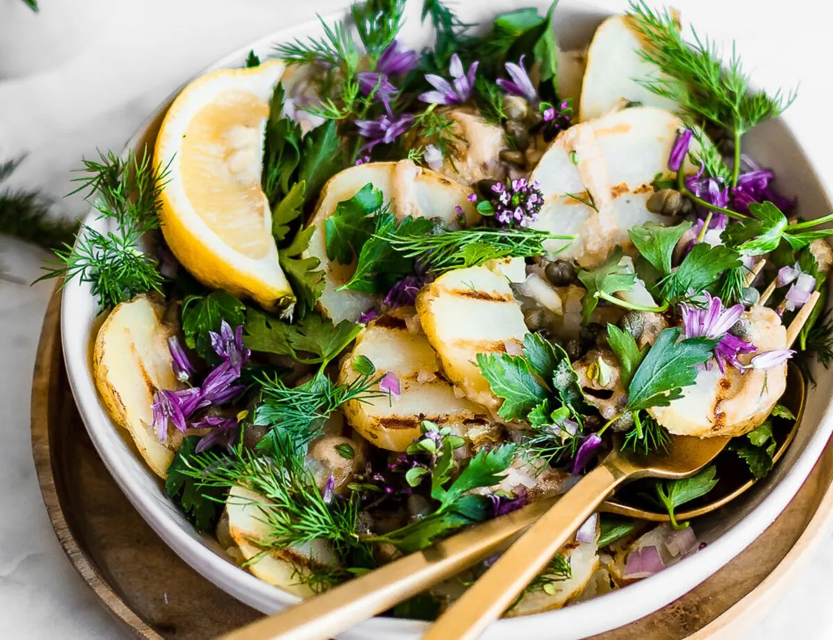Swapping the mayo dressing for a punchy vinaigrette makes this grilled potato salad especially picnic-friendly. (Jennifer McGruther)