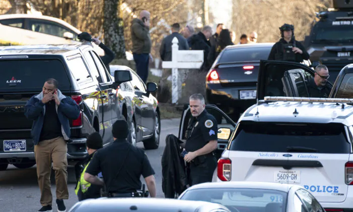 FILE - Nashville Police gather at the scene after a Metro Nashville Police officer shot and killed Grammy-winning sound engineer Mark Capps while at his home to arrest him on warrants on Jan. 5, 2023, in Nashville, Tenn. The fatal shooting of Capps by police earlier this year was “reasonably necessary," a Tennessee prosecutor said on Wednesday, May 24. Capps' 60-year-old wife and 23-year-old stepdaughter told police he had held them in the home at gunpoint, according to police. (Andrew Nelles/The Tennessean via AP, File)
