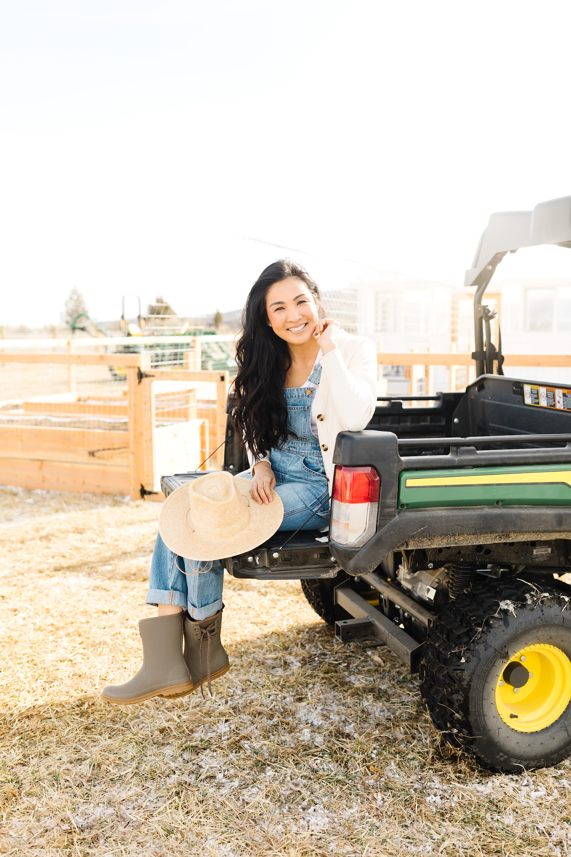 Former school principal, Mandy Davis. sitting on a tractor.