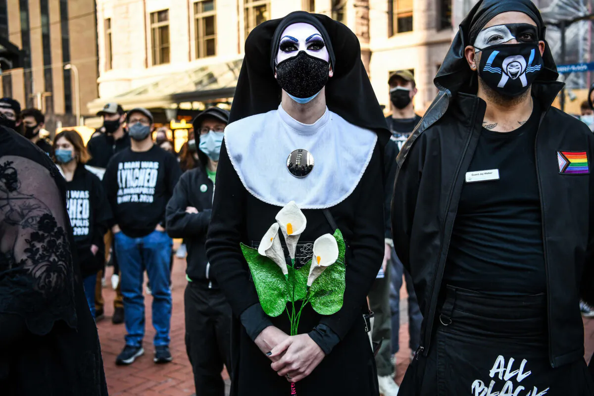 Members of Sisters of Perpetual Indulgence participate in the “I Can’t Breathe-Silent March for Justice” in front of the Hennepin County Government Center on March 7, 2021, where the trial of former Minneapolis police officer Derek Chauvin, charged with murdering African American man George Floyd, will begin, in Minneapolis, on March 8, 2021. (Tribune Content Agency)