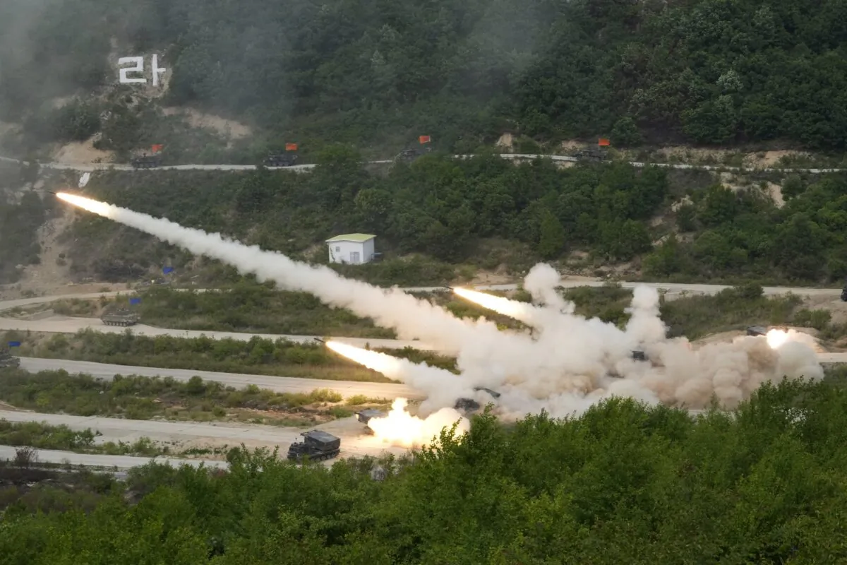 South Korean army's multiple launch rocket systems fire rockets during South Korea–U.S. joint military drills at Seungjin Fire Training Field in Pocheon, South Korea, on May 25, 2023. (Ahn Young-joon/AP Photo)