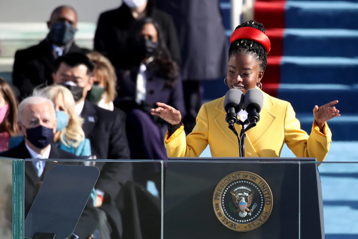 Youth Poet Laureate Amanda Gorman speaks during the inauguration of U.S. President-elect Joe Biden, left, on the West Front of the U.S. Capitol in Washington on Jan. 20, 2021. (Rob Carr/Getty Images)